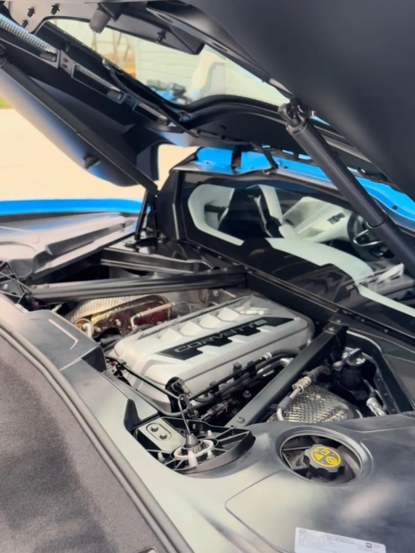 A Corvette C8 engine bay, cleaned and dressed