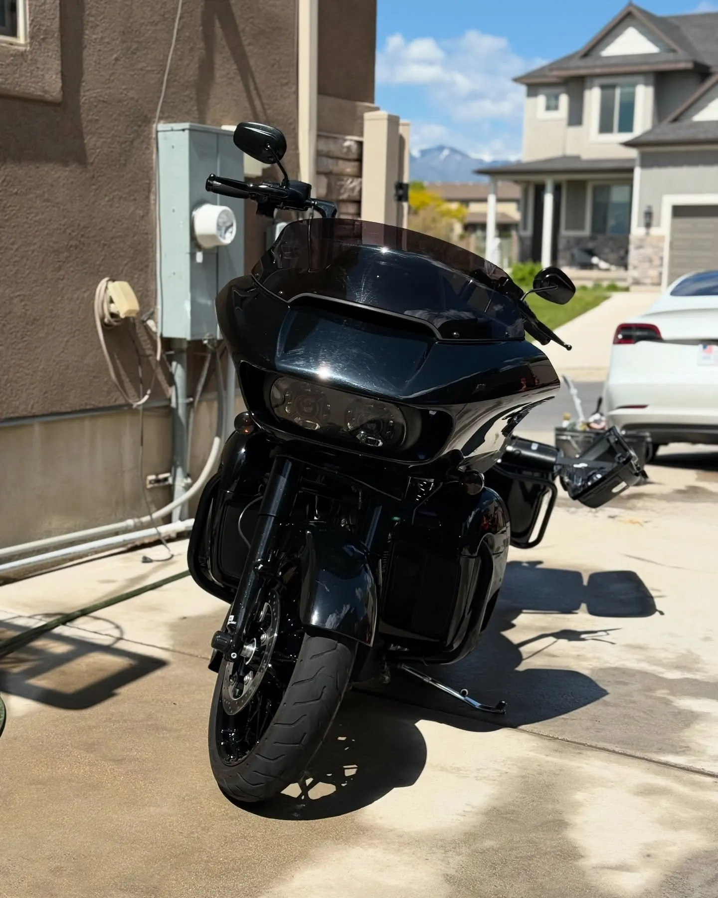 A black Harley-Davidson bagger, full bike in frame